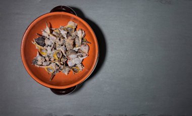 Bolinus brandaris or murici, Plate of seafood morsels with lemon, boiled sea snails, Mediterranean Foo clipart