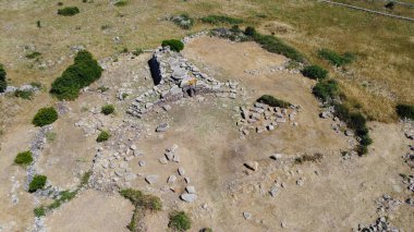Tomb of the Giants Somu de Sorcu in the Giara di Siddi in central Sardinia clipart