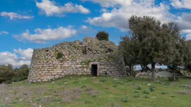 nuraghe Loelle nuragic archaeological site located in the municipality of Budduso in central Sardinia clipart