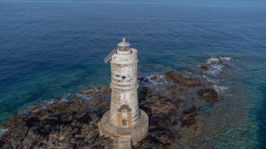 Mangiabarche lighthouse in Calasetta in southern Sardinia, aerial images clipart