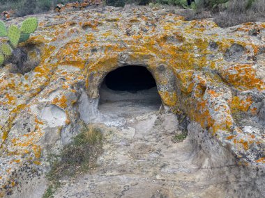 Domus de janas of sas Concas pre-nuragic and nuragic necropolis of Oniferi, Sardinia clipart