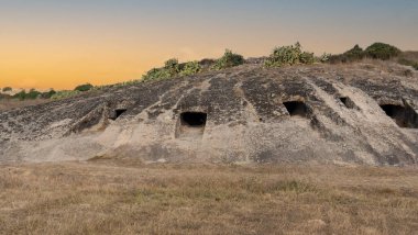 Several domus de janas at the Genna Salixi necropolis near, sardinia, italy clipart