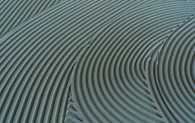 Dekoratif alçı dalgalı bir desen oluşturuyor, arka plan ve dokular için mükemmel.