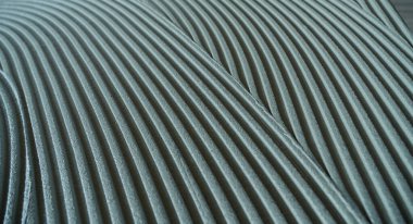 Dekoratif alçı dalgalı bir desen oluşturuyor, arka plan ve dokular için mükemmel.
