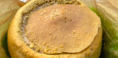 casu marzu or rotten cheese - typical Sardinian cheese containing live insect larvae that create a pungent aroma clipart