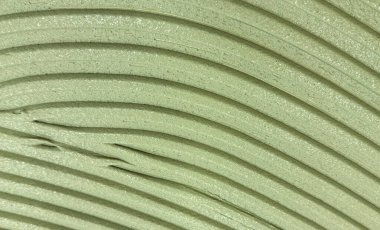 Dikey bej çizgileri ve yumuşak gölgeleri olan desenli yüzey, soyut mimari arka grup