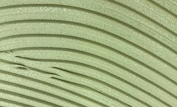 Dikey bej çizgileri ve yumuşak gölgeleri olan desenli yüzey, soyut mimari arka grup