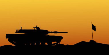 Gün batımına karşı bir tank silueti