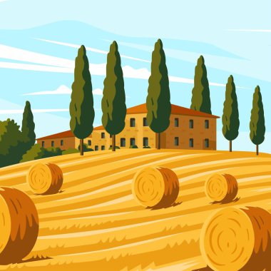 Selvi ağaçları ve binası olan altın bir tarlada saman balyaları.