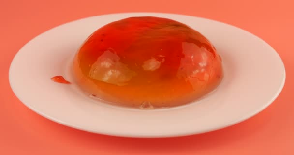 Multi Colored Berry Gelatin Jelly Strawberry Topping White Plate Pink — Stock Video