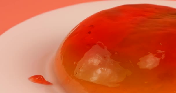 Multi Colored Berry Gelatin Jelly Strawberry Topping White Plate Pink — Stock Video