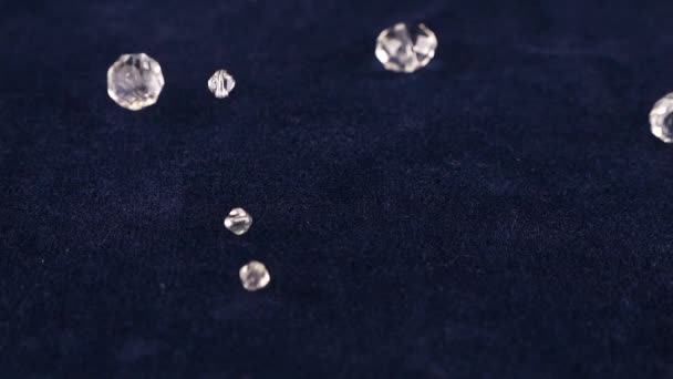 Transparent Jewelry Crystals Rock Crystal Fall Blue Velvet Slow Motion — Vídeos de Stock
