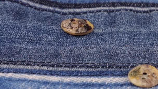 Natural Mother Pearl Buttons Fall Denim Slow Motion — Vídeos de Stock