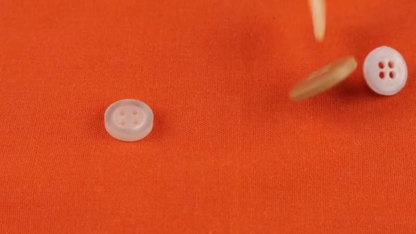 Plastic Multi Colored Buttons Fall Orange Cotton Fabric — Stock video