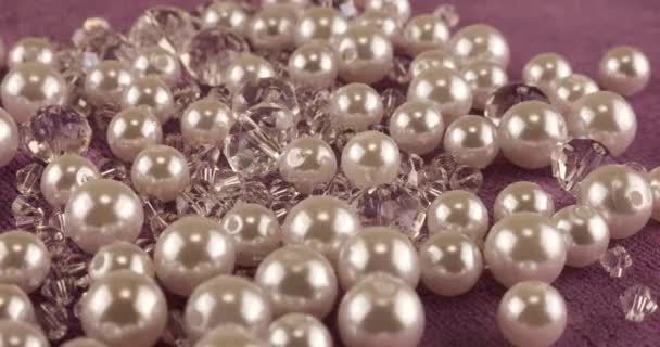 White Pearls Clear Jewelry Crystals Rock Crystal Pink Velvet — Stockvideo
