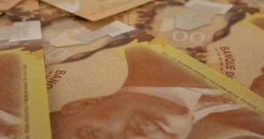 Canadian 100 dollar polymer banknotes with a portrait of Robert Borden.