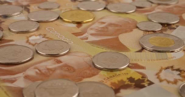 カナダの硬貨とロバート ボーデンの肖像画と100ドルの高分子紙幣 — ストック動画