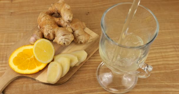 Cooking Drink Citrus Ginger Boost Immunity Lemonade Poured Glass Background — Stockvideo