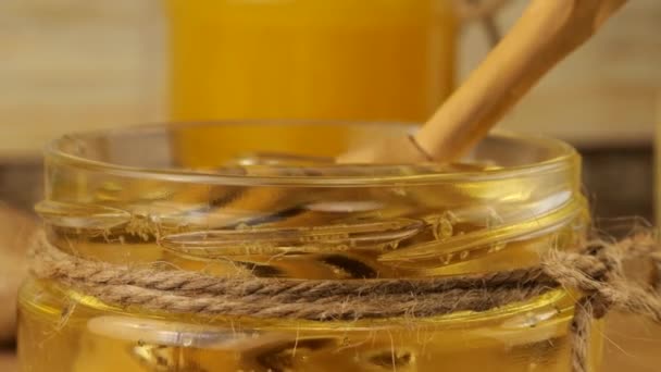 Honey Flows Spoon Spindle Jar Honey Background Jug Lemonade Ginger — Stockvideo