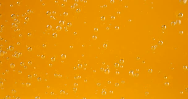 オレンジの背景に気泡 — ストック動画