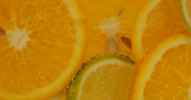 Ripe Citrus Lemonade Orange Lemon Lime Slices Air Bubbles — Stock Video