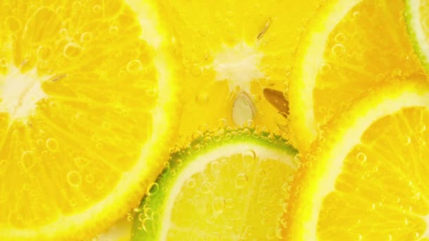 Спелые Цитрусовый Лимонад Апельсин Лимон Ломтики Лайма Пузырьках Воздуха — стоковое видео