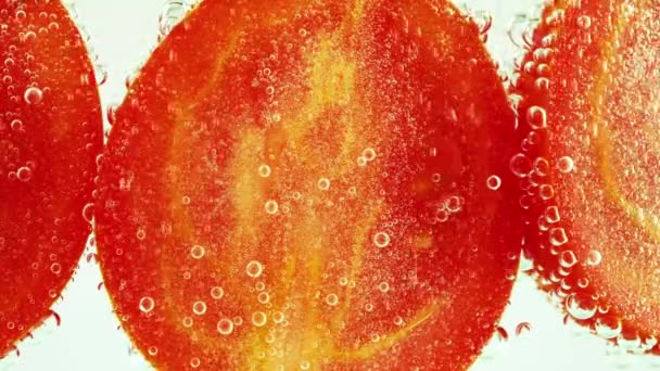 Ripe Tomato Clear Water Air Bubbles — Stockvideo