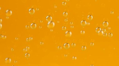 Air bubbles on an orange background.