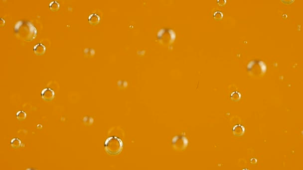 Air Bubbles Orange Background — стоковое видео
