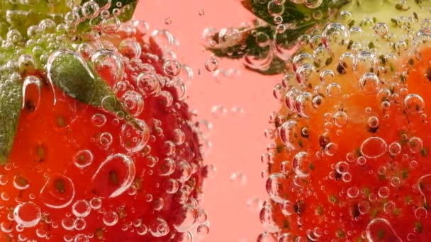Ripe Strawberries Air Bubbles Pink Background — Stock Video