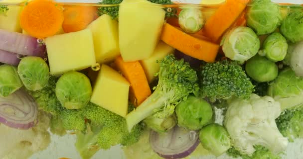 Vegetable Mix Making Soup Boiling Water Air Bubbles — Stock Video