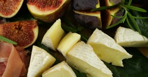 Figs Jamon Spinach Leaves Grapes Blue Cheeses Wooden Board Snacks — Stock Video