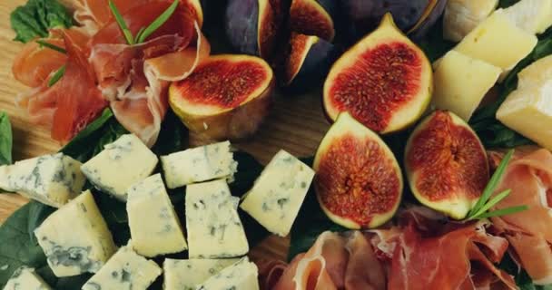 Figs Jamon Spinach Leaves Blue Cheeses Wooden Board — Stock Video
