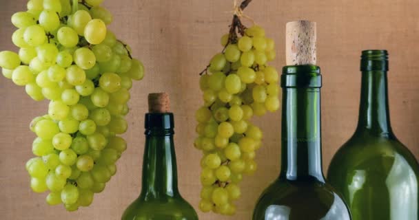 Grapes Bottles Wine Burlap Background — Stock Video