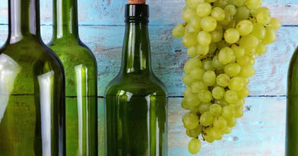 Grapes Wine Bottles Blue Vintage Wooden Background — Stock Video