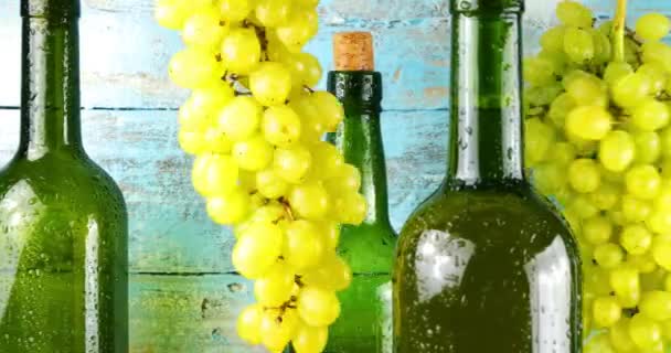 Grapes Wine Bottles Blue Vintage Wooden Background — Stock Video