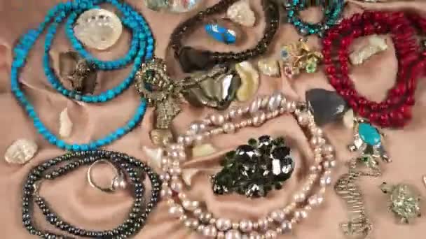 Jewelry Made Precious Stones Pearls Beige Silk Background Underwater Ripples — Stock Video