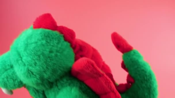 Stuffed Fluffy Plush Toy Green Dragon Playing Dancing Pink Background — Stock Video