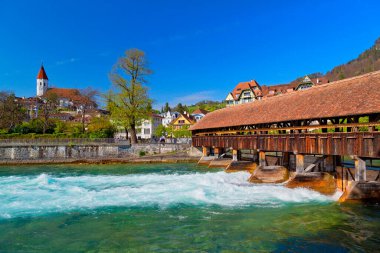 Panoramic view of Thun City, Lake Thun, Swiss Alps, Switzerland clipart