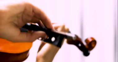 close-up of the correct positioning of the right hand while holding the bow. Musical education