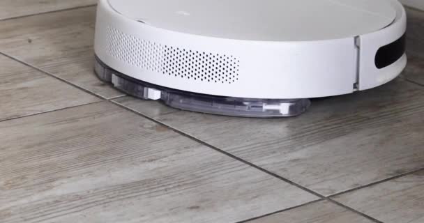 White Robot Vacuum Cleaner Cleans Tiled Floor House Horizontal — 비디오