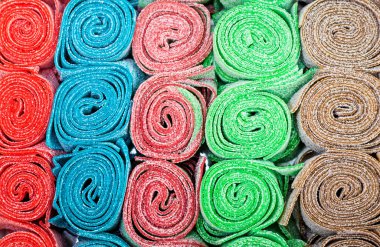 Çok renkli tatlı meyve pastelinden yapılan soyut bir arka plan. Yukarıdan uyuyorlar