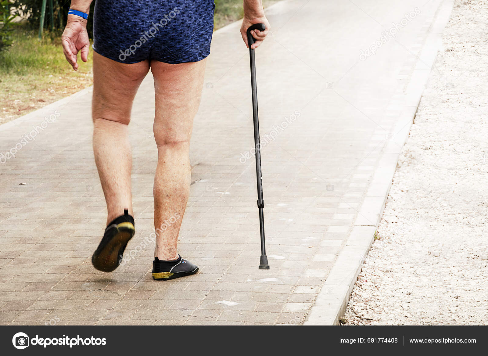 Sore Legs Elderly Man Walking Beach Paths Taking Care Joint Stock Photo sore-legs-elderly-man-walking-beach-paths-taking-care-joint-stock-photo