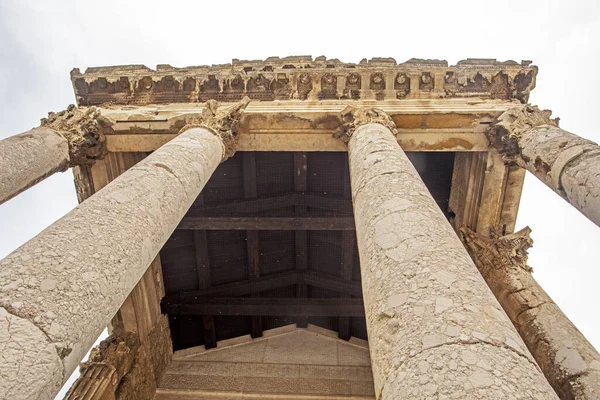 Ancient Greek temple with columns, bottom view. journey