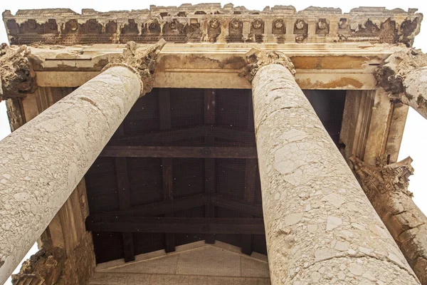 Ancient Greek temple with columns, bottom view. journey
