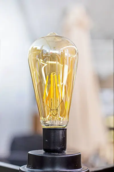 stock image smart, economical light bulb for working without electricity. Blackout. Energy Saving