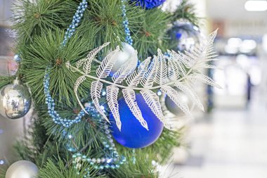 close-up decorative New Year's decoration with artificial flowers and balls.Preparing for Christmas clipart