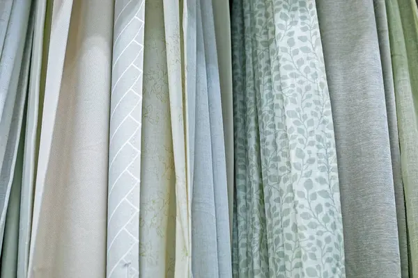 stock image background of various pieces of material for curtains and other decorations in the house