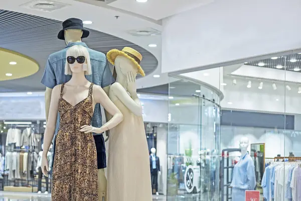 stock image male and female mannequins in stylish clothes and accessorie