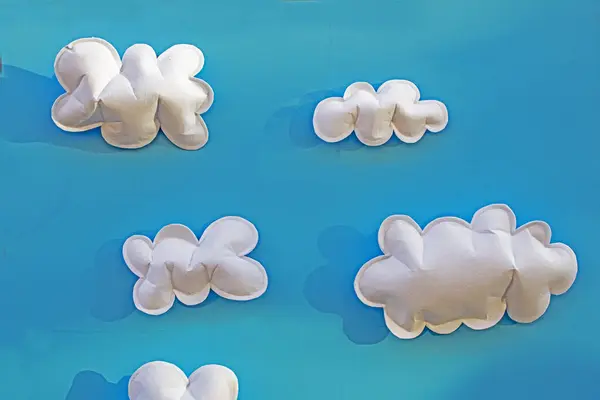 stock image decorative blue background with paper volumetric clouds